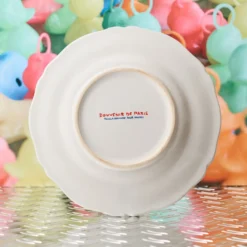 Assiette plate en faïence Boucher