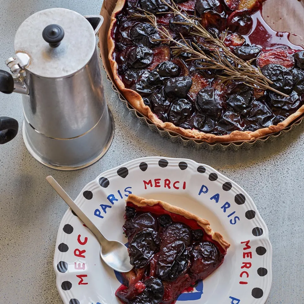 Assiette plate en faïence Merci