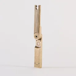 Briquet à arc pivotant