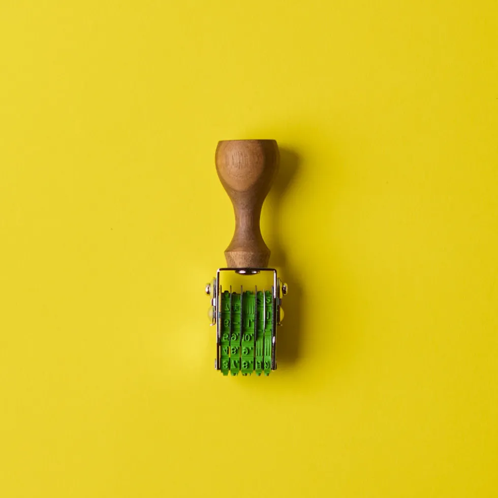 Tampon dateur rotatif en bois